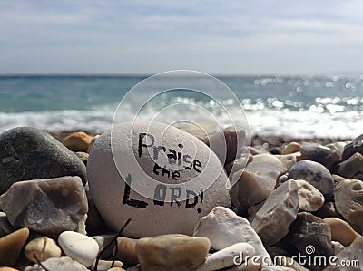 Praise The LORD & x28;Stone on Beach& x29; Stock Photo